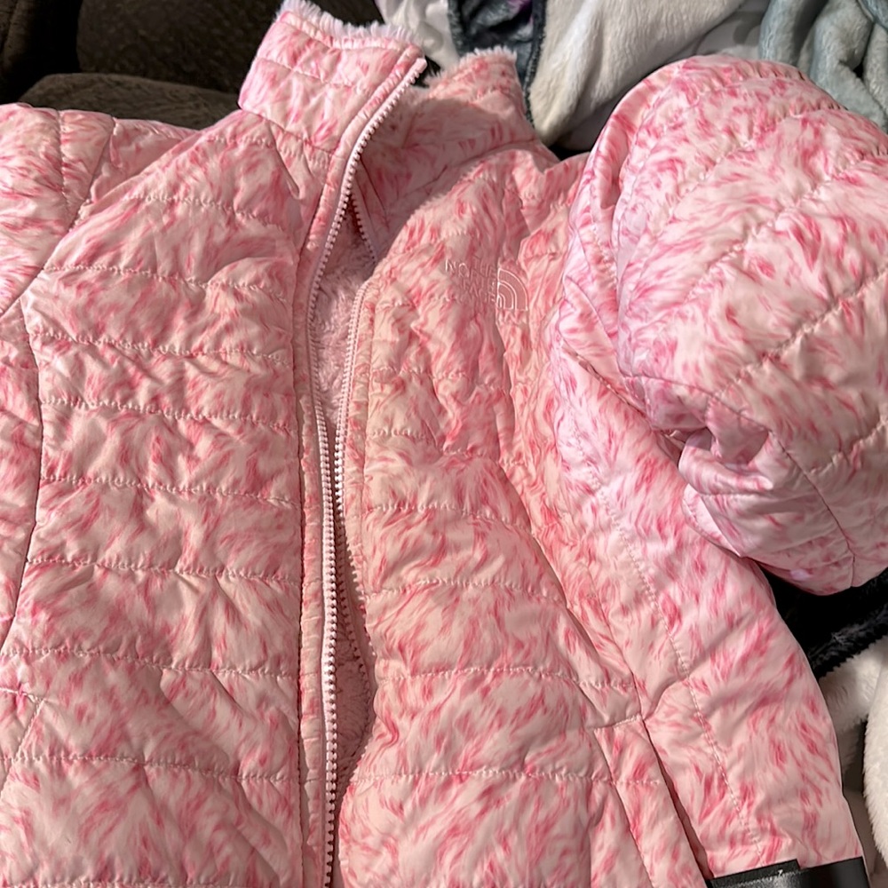 Pink north face  reversible jacket . Girls size 10/12.